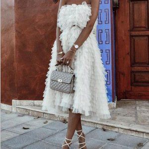 A sleeveless dress with bare shoulde